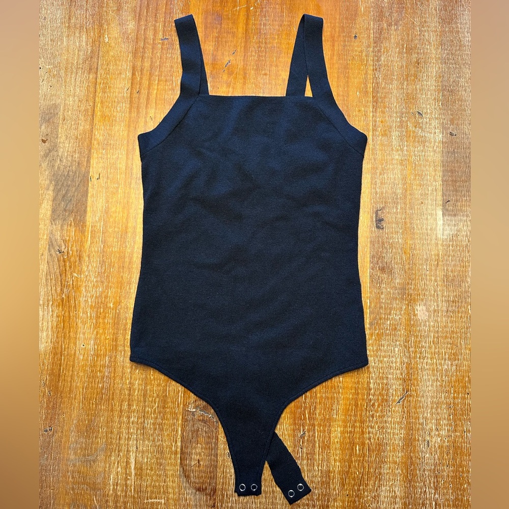 BNWOT never been worn, thong bodysuit.